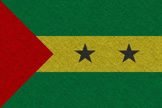 Sao Tome and Principe fabric flag. Patriotic background. National flag of Sao Tome and Principe