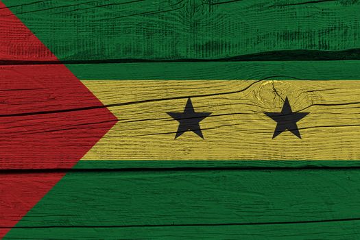 Sao Tome and Principe flag painted on old wood plank. Patriotic background. National flag of Sao Tome and Principe