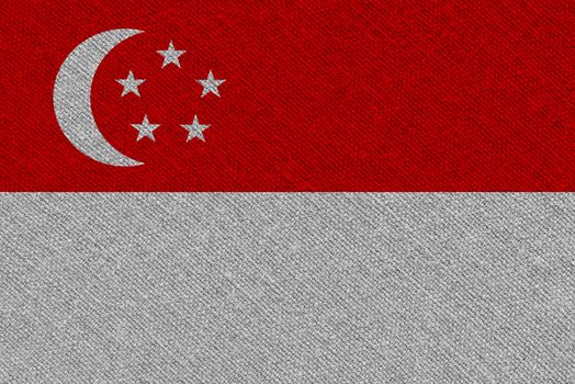 Singapore fabric flag. Patriotic background. National flag of Singapore