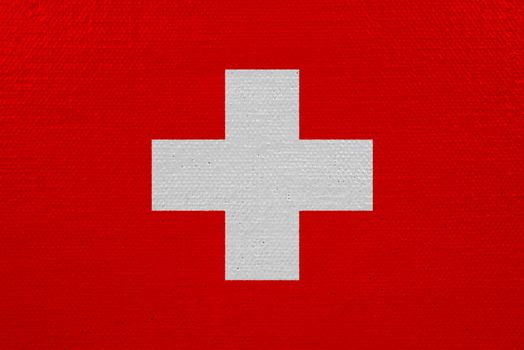 Switzerland flag on canvas. Patriotic background. National flag of Switzerland