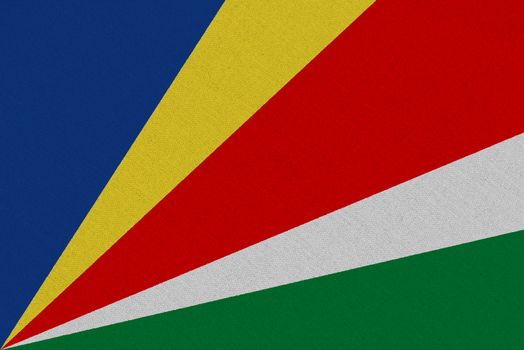 Seychelles fabric flag. Patriotic background. National flag of Seychelles