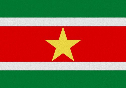 Suriname paper flag. Patriotic background. National flag of Suriname