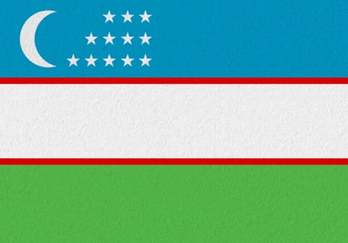 Uzbekistan paper flag. Patriotic background. National flag of Uzbekistan