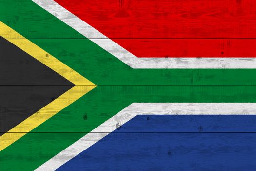 South Africa flag painted on old wood plank. Patriotic background. National flag of South Africa