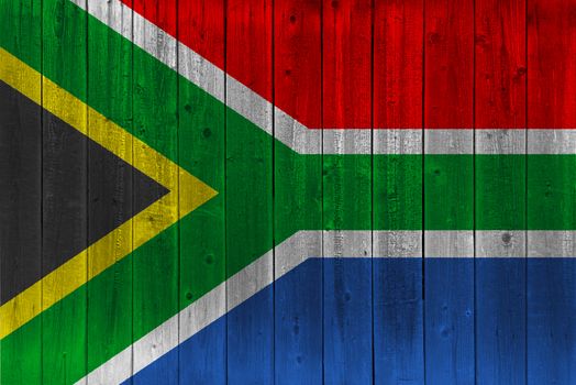 South Africa flag painted on old wood plank. Patriotic background. National flag of South Africa