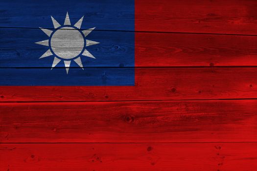 Taiwan flag painted on old wood plank. Patriotic background. National flag of Taiwan