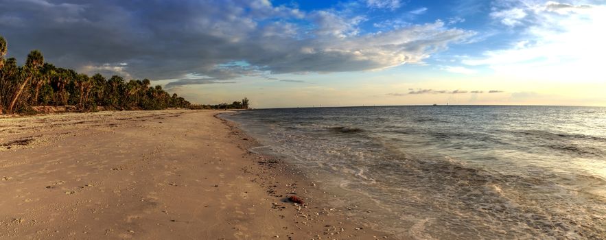 Dark sky over the waters off Barefoot Beach in Bonita Springs, Florida