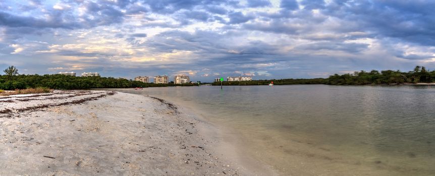 Dark sky over the waters off Barefoot Beach in Bonita Springs, Florida