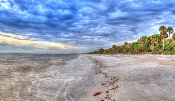 Dark sky over the waters off Barefoot Beach in Bonita Springs, Florida