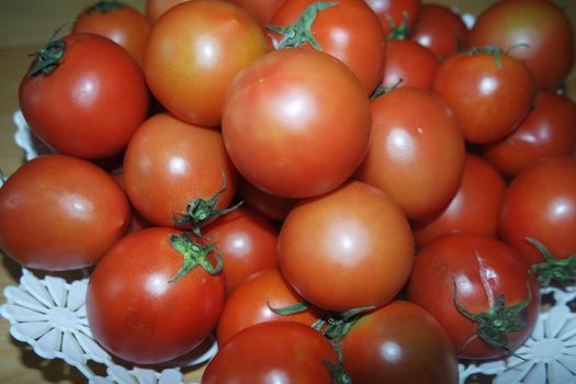 Close-up view of red tomatoes in market for sale. A fruit background for text and advertisements