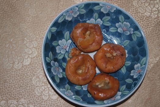 Closeup of delicious and tasty Asian sweet dish called balu shahi or baloshahi or balushahi. This dish is street sweet found in Pakistan India and Bangladesh and served in the festivities.