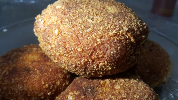 Closeup view of fried pizza bomb or pizza balls. Pizza bombs are delicious and tasty altered form of pizza.