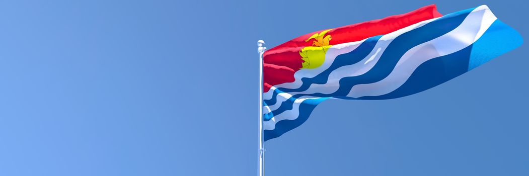 3D rendering of the national flag of Kiribati waving in the wind against a blue sky