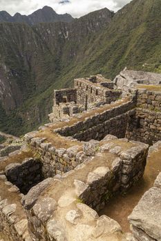 Machu Picchu, Peru - April 6, 2014: Architecture and details of the ancestral constructions and buildings of the Inca civilization, in Machu Picchu, Peru.