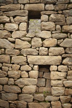 Machu Picchu, Peru - April 6, 2014: Architecture and details of the ancestral constructions and buildings of the Inca civilization, in Machu Picchu, Peru.