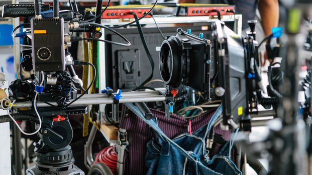 Film industry. Image of professional camera and equipment background