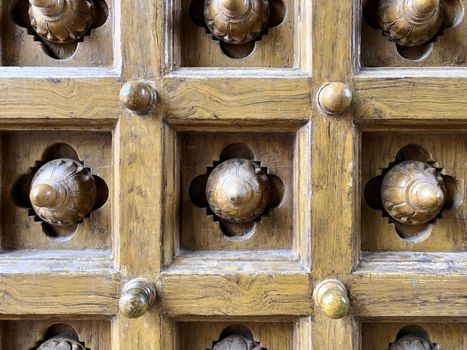 Ancient door decoration on the ancient temple in Tamilnadu.
