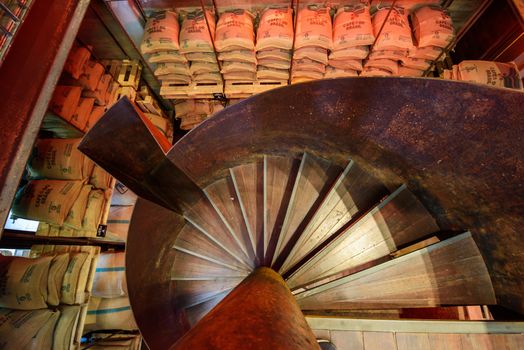 Bangkok, Thailand - 16 September, 2020: Old style staircase in  NANA Hunter Coffee Roasters shop