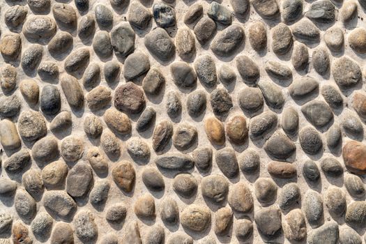 Old natural stone wall, background, texture or pattern. Rustic texture. Wall with bricks of italian stones.