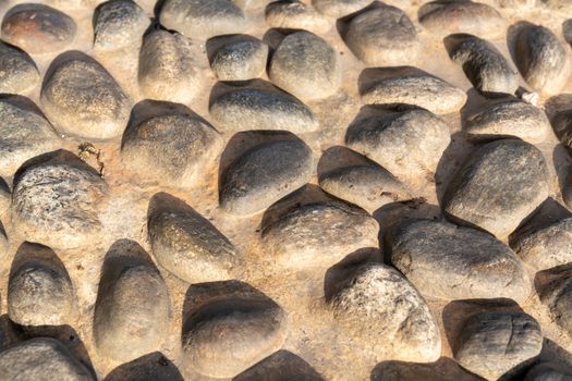 Old natural stone wall, background, texture or pattern. Rustic texture. Wall with bricks of italian stones.