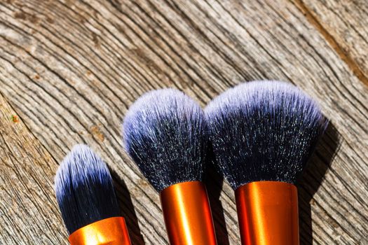 Make-up concept. Make-up brushes.  Concelear brush, foundation brush, blush brush and powder brush.