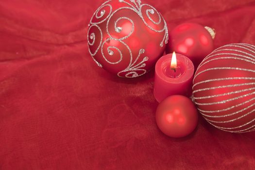 Red Christmas decoration with candle light and copy space