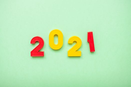 Happy New year 2021 celebration. The inscription 2021 on the green background