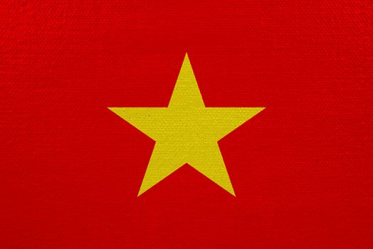 Vietnam flag on canvas. Patriotic background. National flag of Vietnam