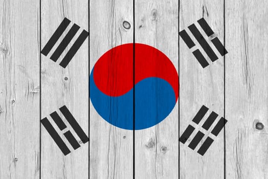 South korea flag painted on old wood plank. Patriotic background. National flag of South korea