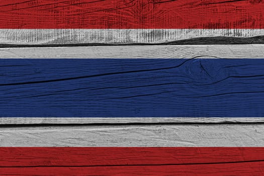 Thailand flag painted on old wood plank. Patriotic background. National flag of Thailand