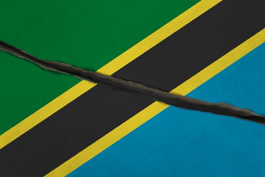 Tanzania flag cracked. Patriotic background. National flag of Tanzania