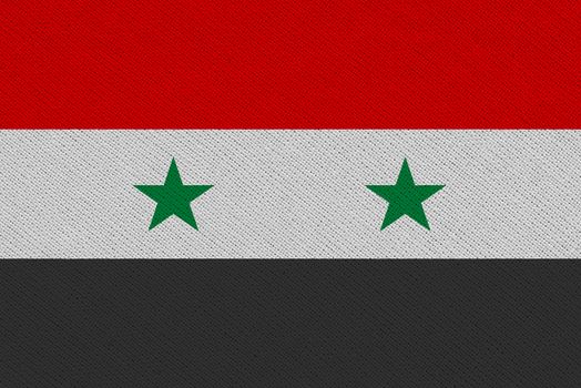 Syria fabric flag. Patriotic background. National flag of Syria