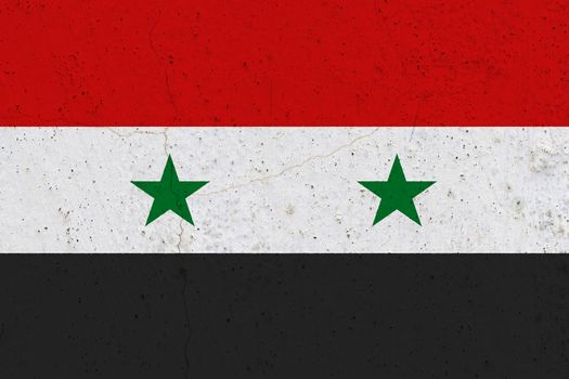 Syria flag on concrete wall. Patriotic grunge background. National flag of Syria