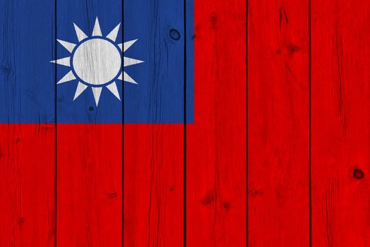 Taiwan flag painted on old wood plank. Patriotic background. National flag of Taiwan