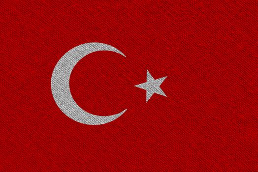 Turkey fabric flag. Patriotic background. National flag of Turkey