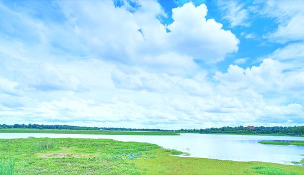 A vintage view of the afternoon river with dense clouds