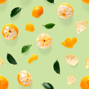 Mandarin seamless pattern, tangerine, clementine isolated on green background with green leaves. Collection of fine Mandarine seamless patterns.