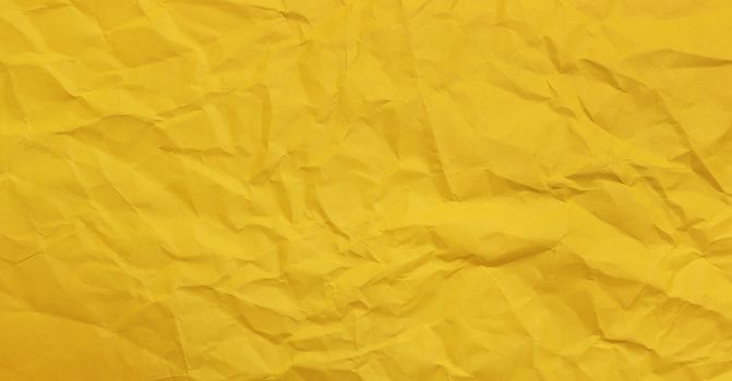 Yellow clumped Paper texture background, kraft paper horizontal with Unique design of paper, Natural paper style For aesthetic creative design