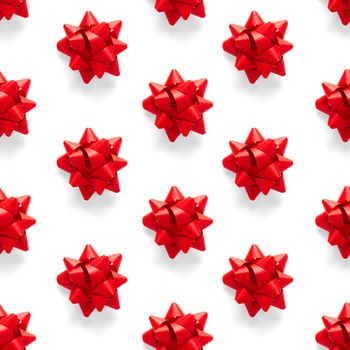 Seamless regular creative Christmas pattern with New Year decorations on white background. xmas Modern Seamless pattern made from christmas decorations. Photo quality pattern for fabric, prints, wallpapers, banners or creative design works.