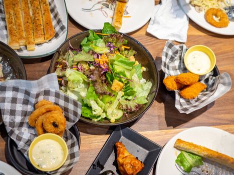 Picture of a full table ready to eat For a celebration at all occasions.Food festival concept.