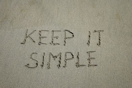 Keep it simple. Inspiration and motivation quote 'keep it simple' with red leaf background.