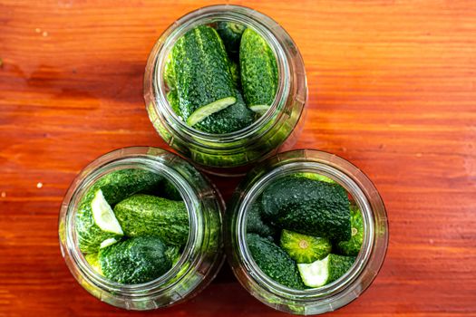 cucumbers in jars, the process of making pickled gherkins