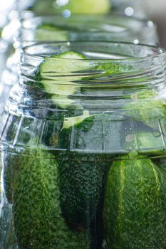 cucumbers in jars, the process of making pickled gherkins