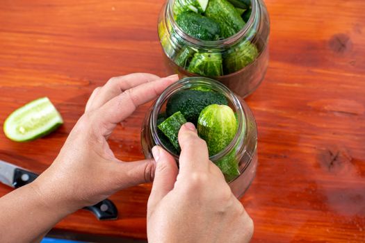 cucumbers in jars, the process of making pickled gherkins