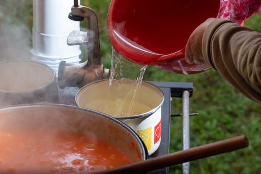 Cooking Ajvar made of tomatoes and paprika buy the old recepies