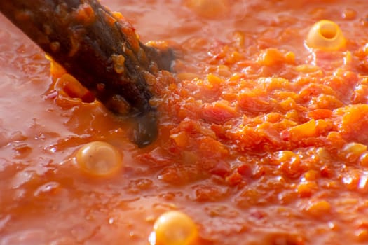 Cooking Ajvar made of tomatoes and paprika buy the old recepies