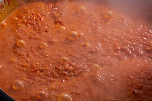 Cooking Ajvar made of tomatoes and paprika buy the old recepies