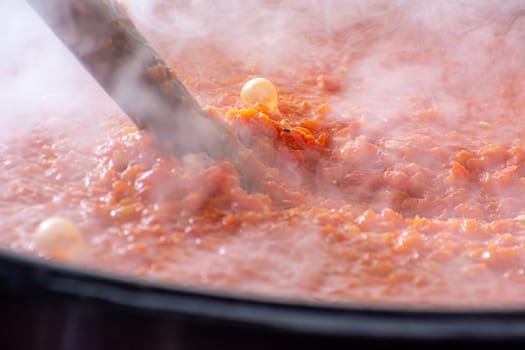 Cooking Ajvar made of tomatoes and paprika buy the old recepies