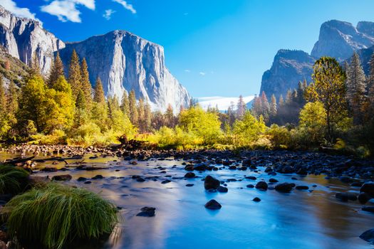 The view from within Yosemite Valley and Northside Drive of surrounding rock faces on a sunny autumn morning in California, USA