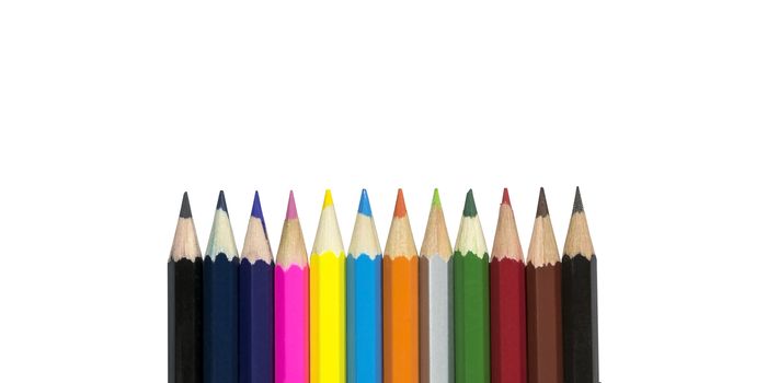 Group of color pencils for art on white background.